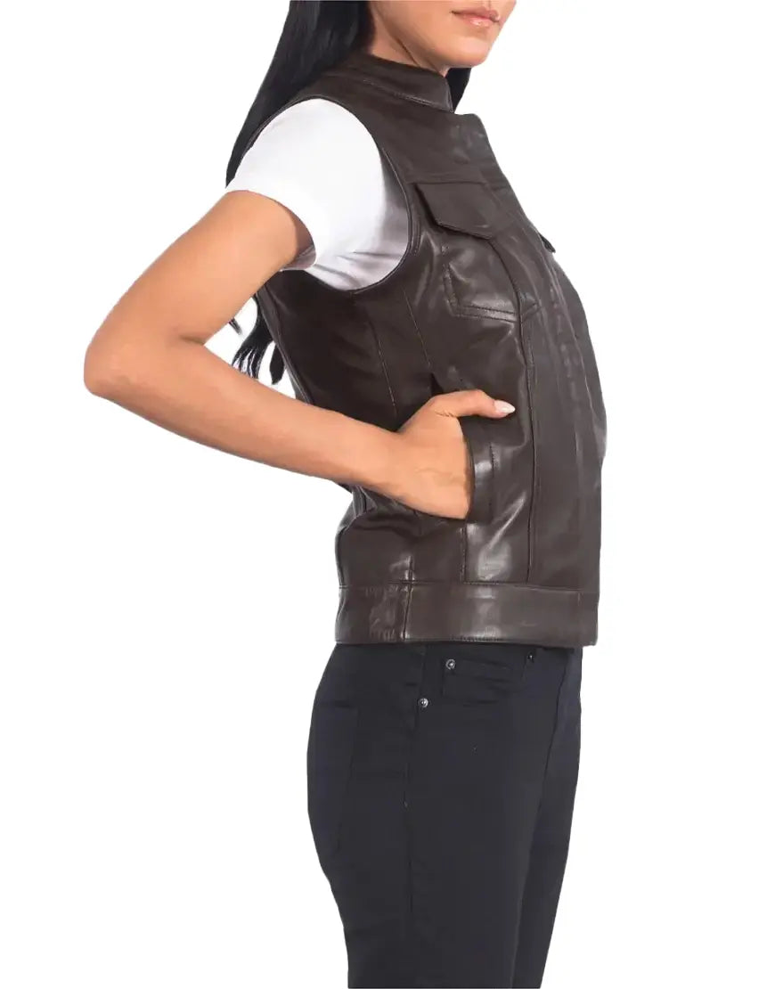 Brown leather vest worn by a person on a white background
