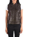 Brown leather vest worn by a person on a white background